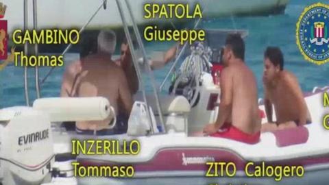 Police footage of suspects on a boat off Sicily