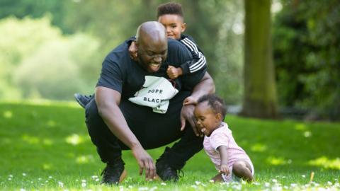 Marvyn Harrison with his two children