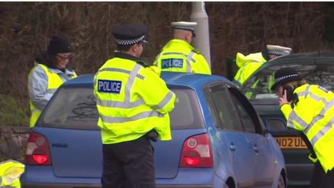 Devon and Cornwall Police checking a car