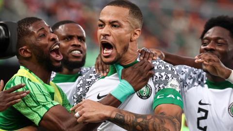 William Troost-Ekong celebrates scoring for Nigeria against Ivory Coast at the 2023 Africa Cup of Nations