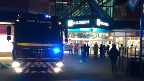 Fire engine outside of shopping centre