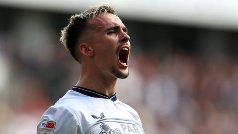 Liam Millar celebrates scoring Preston's second goal against Plymouth