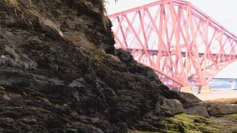 Exposed Lothian oil shale near the Forth Bridge is similar to what was mined in the 1950s and 60s