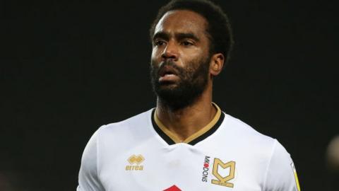 Cameron Jerome in action for MK Dons