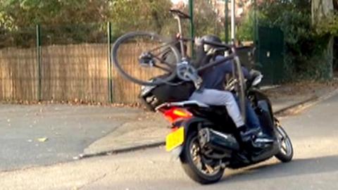 Thieves on moped with a stolen bike