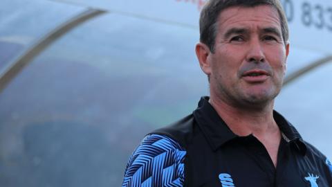 Mansfield Town boss Nigel Clough in the dugout