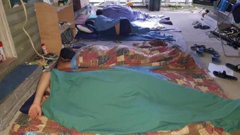 Men sleeping in the closed Manus Island detention centre on Monday