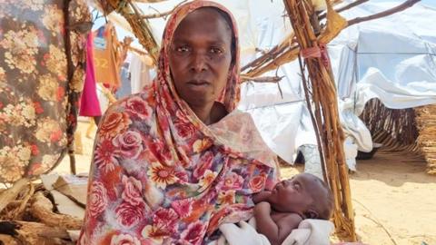 Arafa Adoum with her baby in a refugee camp in Chad
