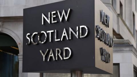 File photo of the New Scotland Yard sign