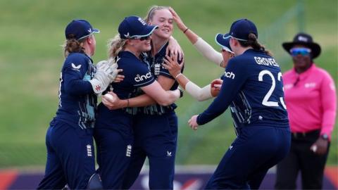 England celebrate after a wicket