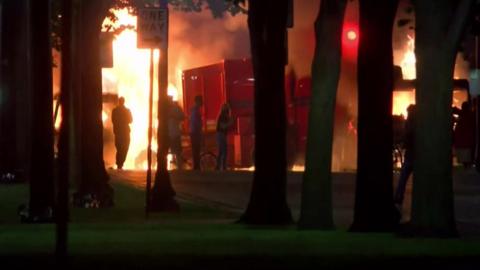 A fire is started by protesters in Kenosha, Wisconsin