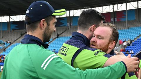 Skipper Andrew Balbirnie is about to join George Dockrell in embracing Paul Stirling after Ireland's thumping win over West Indies in Hobart