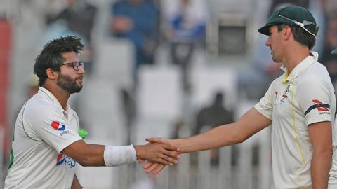 Pakistan's Imam ul-Haq (left) and Australia's Pat Cummins