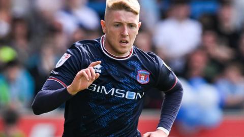 Joel Senior in action for Carlisle