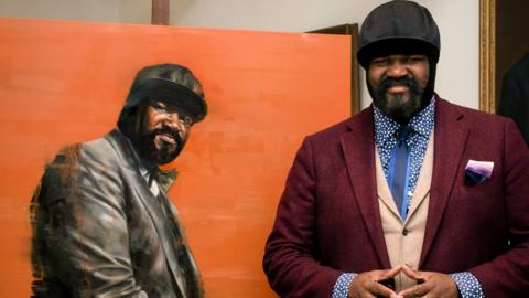 Gregory Porter with his portrait