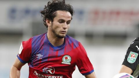 Lewis Travis in action for Blackburn against Newcastle