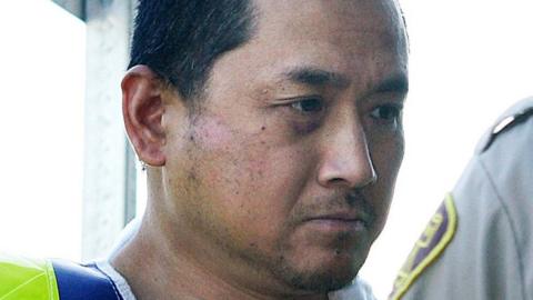 Vince Weiguang Li, accused of stabbing, beheading and cannibalizing another man on a Greyhound bus in Canada ,is brought to a Portage La Prairie court on 5 August, 2008