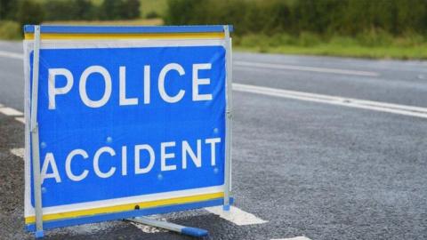 Police accident sign in road