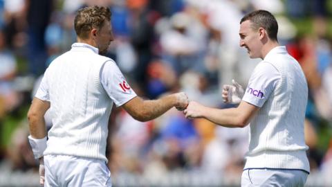 Joe Root and Harry Brook bump fists