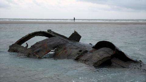 Wreckage of a German submarine which ran aground off the coast of Wissant in July 1917 and has resurfaced due to to sand movements