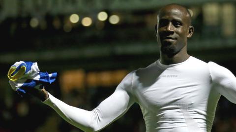 Albert Adomah celebrates after scoring the winning penalty against Leyton Orient