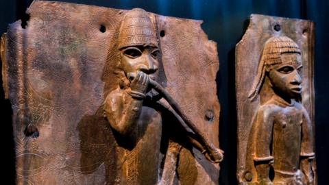 Sculptures looted by British soldiers from the Kingdom of Benin in 1897 hangs on display in the "Where Is Africa" exhibition at the Linden Museum