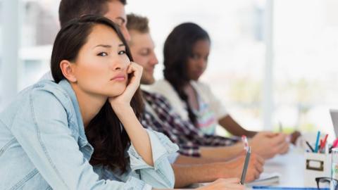 Bored woman in meeting