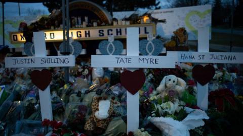 Memorial for the four victims photographed outside Oxford High School in December 2021.