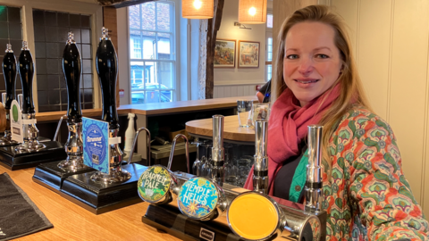 Owner Leonora Faggionato behind the bar