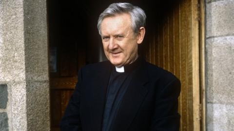 Niall Toibin as Fr. MacAnally