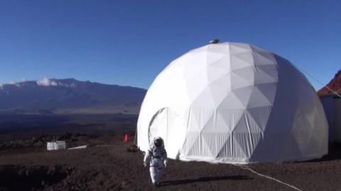 A Nasa team has emerged from a Mars simulation in Hawaii, where they lived in near isolation for a year.