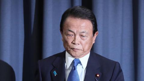 Japan's Finance Minister Taro Aso attends a press conference in Tokyo on 4 June 2018