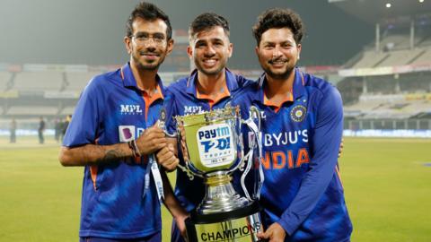 India players celebrate with the trophy after beating West Indies in the final T20