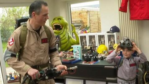 Simon Gray and one of his children in Ghostbusters outfits