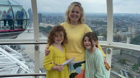 Sue McKellar with her two girls