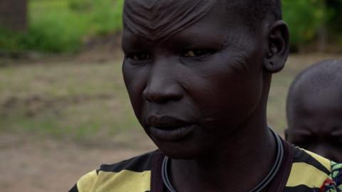 South Sudanese woman with markings on her forehead