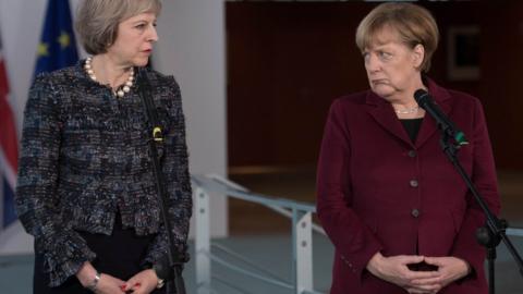 Theresa May and Angela Merkel