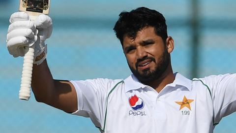 Pakistan batsman Babar Azam raises his bat in celebration after reaching his ton in the second Test against Sri Lanka