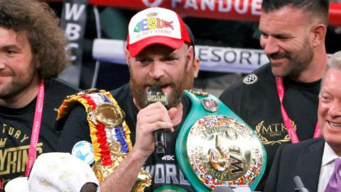 Tyson Fury speaks on the mic