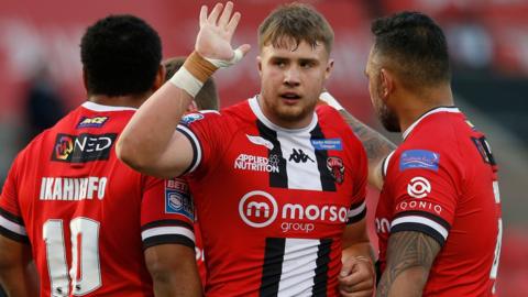 Salford celebrate a try against Leigh