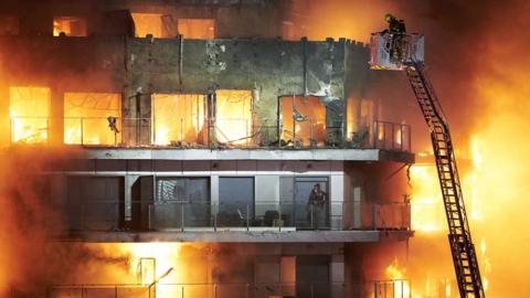 Fire has swept through two buildings in the Campanar neighborhood of Valencia, Spain