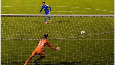 Trae Coyle struck Gillingham's winning penalty in the shoot-out to earn a third-round trip to either Wolves or Stoke