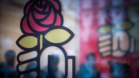 French Socialist Party (PS) logo on a door at the Party headquarters in Paris