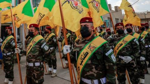 Members of Kataeb Hezbollah, part of the Islamic resistance in Iraq, in Baghdad on 21 November 2023
