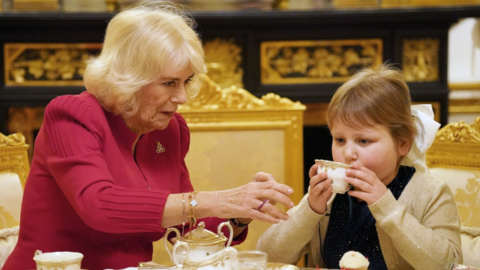 Olivia Taylor tried her very first cup of tea, which was poured by the Queen