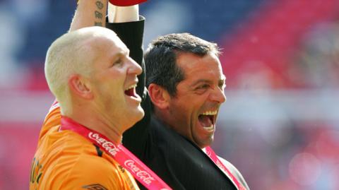 Dean Windass (left) and Phil Brown celebrate after Hull's promotion to the Premier League in 2008