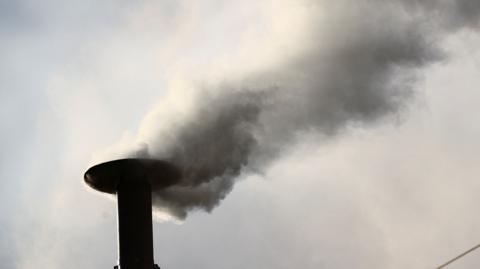 White smoke rises from the chimney on the Sistine Chapel