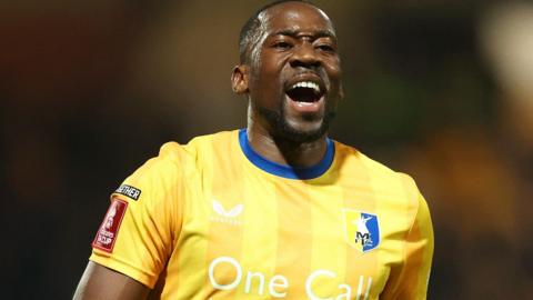 Lucas Akins in action for Mansfield Town