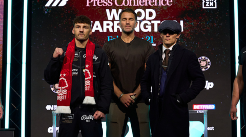 Leigh Wood, Josh Warrington and Eddie Hearn pose for photos at the news conference in Nottingham 