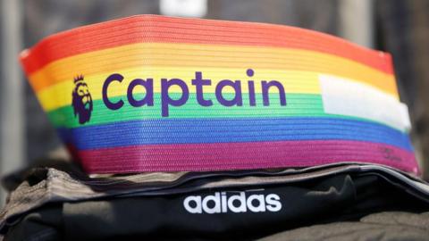 A rainbow-coloured armband with the Premier League logo and captain written on it